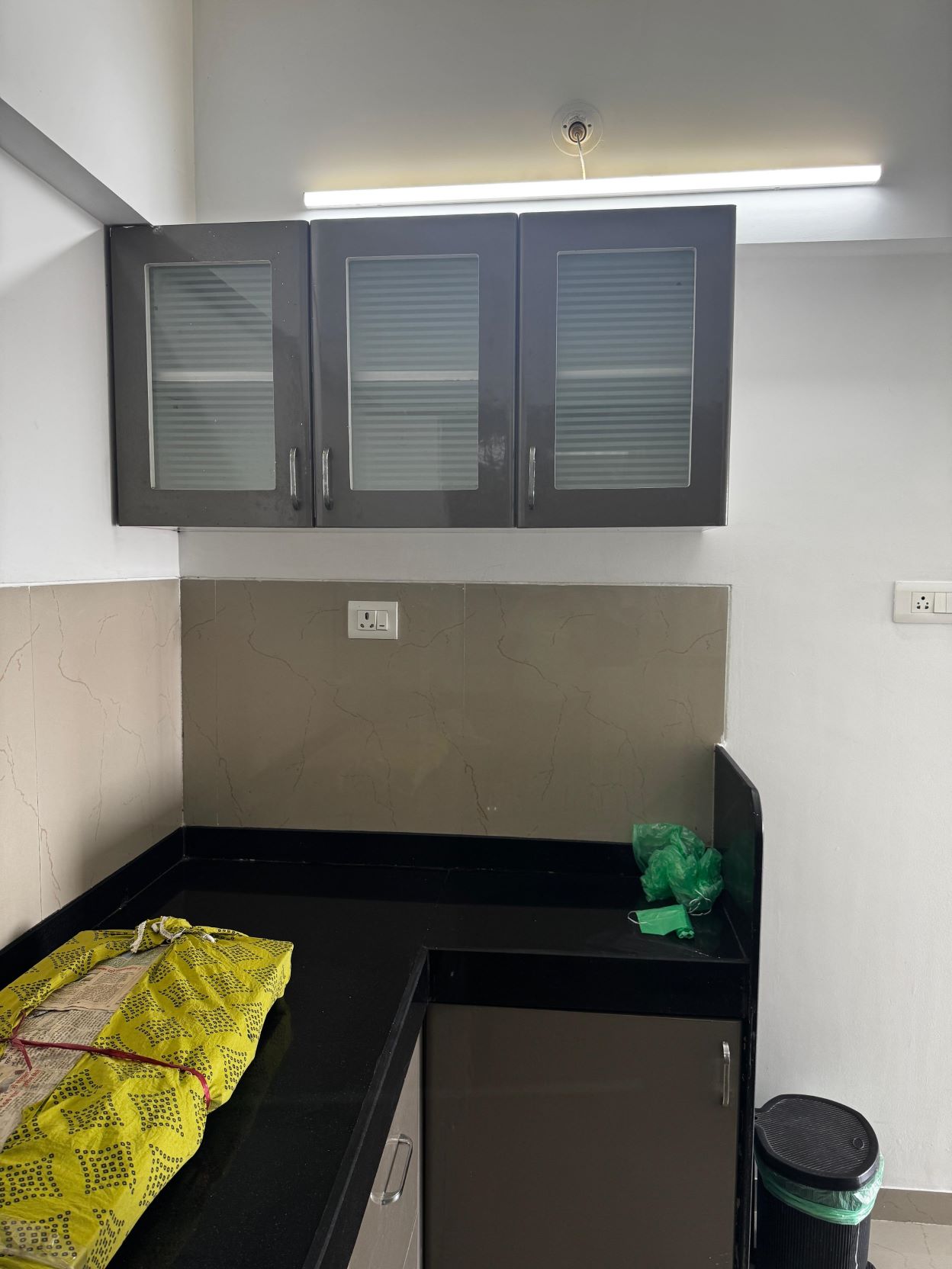 Functional kitchen with storage cabinets and refrigerator