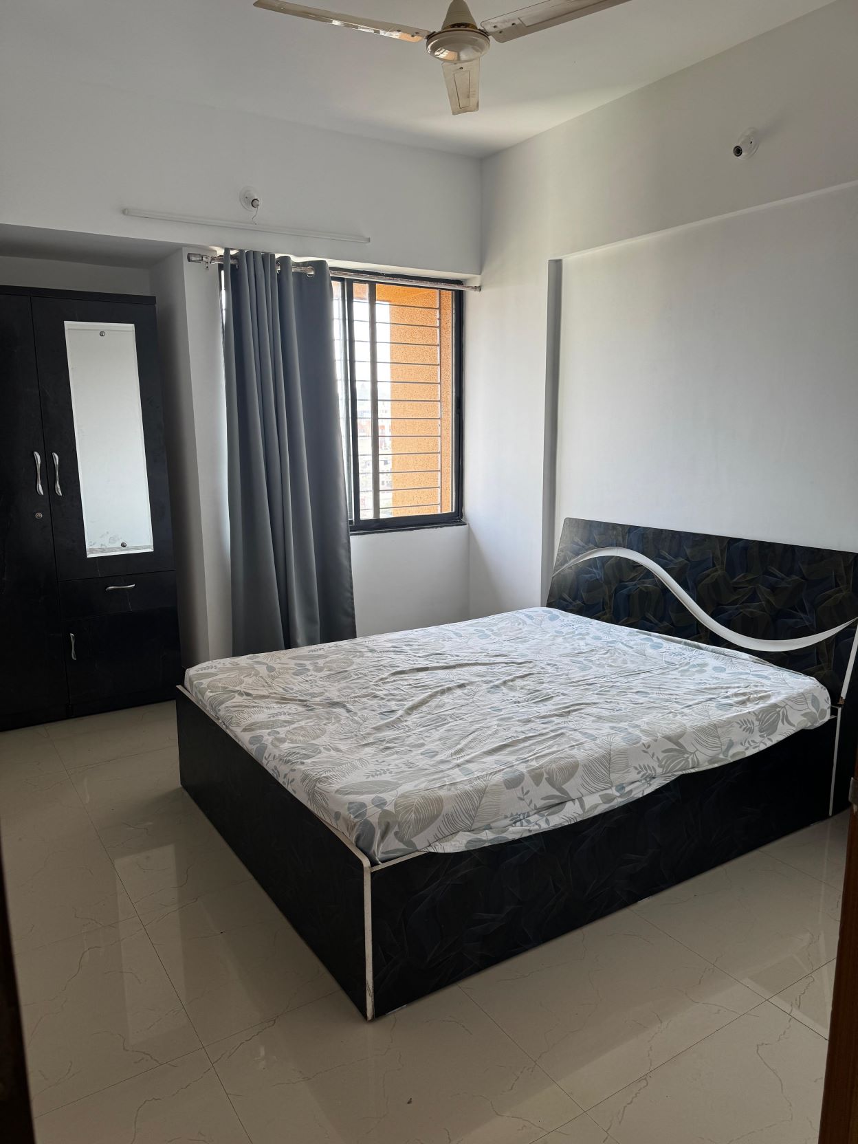 Fully furnished bedroom with bed, mattress & wardrobe